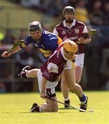 14 April 2002; Brian Higgins of Galway in action against Eoin Kelly of Tipperary during the Allianz National Hurling League Quarter-Final match between Galway and Tipperary at Semple Stadium in Thurles, Tipperary. Photo by Brendan Moran/Sportsfile