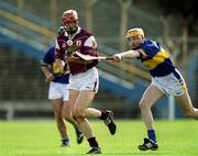 14 April 2002; Declan O'Brien of Galway in action against John Carroll of Tipperary during the Allianz National Hurling League Quarter-Final match between Galway and Tipperary at Semple Stadium in Thurles, Tipperary. Photo by Brendan Moran/Sportsfile