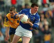 14 April 2002; James Doonan of Cavan in action against Jonathan Dunning of Roscommon during the Allianz National Football League Semi-Final match between Cavan and Roscommon at Cusack Park in Mullingar, Westmeath. Photo by Aoife Rice/Sportsfile