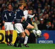 17 April 2002; Robbie Keane of Republic of Ireland in action against Gregg Berhalter of USA during the International Friendly match between Republic of Ireland and USA at Lansdowne Road in Dublin. Photo by Brendan Moran/Sportsfile