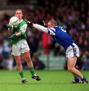 21 April 2002; Jer O'Shea of Coláiste na Sceilge in action against Gary Galvin of St Jarlath's College during the Post Primary Schools Hogan Cup Senior A Football Championship Semi-Final Replay match between St Jarlath's College and Coláiste na Sceilge at the Gaelic Grounds in Limerick. Photo by Damien Eagers/Sportsfile