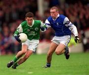 21 April 2002; Kieran Cronin of Coláiste na Sceilge in action against Gary Galvin of St Jarlath's College during the Post Primary Schools Hogan Cup Senior A Football Championship Semi-Final Replay match between St Jarlath's College and Coláiste na Sceilge at the Gaelic Grounds in Limerick. Photo by Damien Eagers/Sportsfile