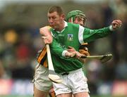 21 April 2002; Ciarán Carey of Limerick in action against Richard Mullally of Kilkenny during the Allianz National Hurling League Semi-Final match between Kilkenny and Limerick at Gaelic Grounds in Limerick. Photo by Damien Eagers/Sportsfile