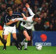 17 April 2002; Robbie Keane of Republic of Ireland in action against Gregg Berhalter of USA during the International Friendly match between Republic of Ireland and USA at Lansdowne Road in Dublin. Photo by Brendan Moran/Sportsfile