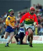 14 April 2002; Pat Cody of Carlow in action against Thomas Lennon of Roscommon during the Allianz National Hurling League Division 2 Relegation Play-Off match between Carlow and Roscommon at Cusack Park in Mullingar, Westmeath. Photo by Aoife Rice/Sportsfile