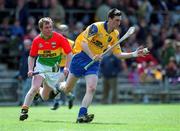 14 April 2002; Shane Sweeney of Rosommon in action against Andrew Gaul of Carlow during the Allianz National Hurling League Division 2 Relegation Play-Off match between Carlow and Roscommon at Cusack Park in Mullingar, Westmeath. Photo by Aoife Rice/Sportsfile