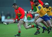 14 April 2002; Gary Doyle of Carlow in action against Mickey Cunniffe of Roscommon during the Allianz National Hurling League Division 2 Relegation Play-Off match between Carlow and Roscommon at Cusack Park in Mullingar, Westmeath. Photo by Aoife Rice/Sportsfile