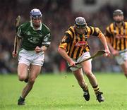 21 April 2002; Eddie Brennan of Kilkenny in action against Stephen Lucey of Limerick during the Allianz National Hurling League Semi-Final match between Kilkenny and Limerick at Gaelic Grounds in Limerick. Photo by Damien Eagers/Sportsfile