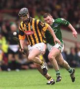 21 April 2002; John Hoyne of Kilkenny in action against Mark Foley of Limerick during the Allianz National Hurling League Semi-Final match between Kilkenny and Limerick at Gaelic Grounds in Limerick. Photo by Damien Eagers/Sportsfile