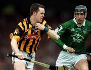 21 April 2002; Michael Kavanagh of Kilkenny in action against Mark Keane of Limerick during the Allianz National Hurling League Semi-Final match between Kilkenny and Limerick at Gaelic Grounds in Limerick. Photo by Damien Eagers/Sportsfile