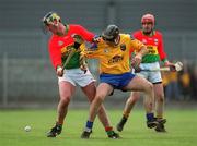 14 April 2002; Des Murphy of Carlow in action against Tom Reddington of Roscommon during the Allianz National Hurling League Division 2 Relegation Play-Off match between Carlow and Roscommon at Cusack Park in Mullingar, Westmeath. Photo by Aoife Rice/Sportsfile