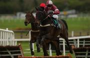 25 April 2002; Spendid, with W.J. Marston up, jumps the last during the Kevin McManus Bookmakers Champion Stayers Hurdle at Punchestown Racecourse in Naas, Kildare. Photo by Aoife Rice/Sportsfile