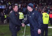 28 April 2002; Eugene McKenna, left, Tyrone manager, shakes hands with Mattie Kerrigan, Cavan manager, at the final whistle. Tyrone v Cavan, Allianz National Football League Final, St. Tighnearnachs Park, Clones, Co. Monaghan. Picture credit; Damien Eagers / SPORTSFILE