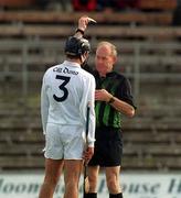 28 April 2002; John Brennan of Kildare is issued a second yellow card by referee J.A. Gribben as he is sent off during the Guinness Leinster Senior Hurling Championship First Round match between Westmeath and Kildare at Cusack Park in Mullingar, Westmeath. Photo by Aoife Rice/Sportsfile