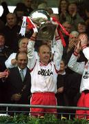 28 April 2002; Tyrone captain Peter Canavan lifts the cup after the Allianz National Football League Division 1 Final match between Tyrone and Cavan at St Tiernach's Park in Clones, Monaghan. Photo by Pat Murphy/Sportsfile