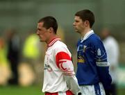 28 April 2002; Brian McGuigan of Tyrone and Colm Hannon of Cavan stand for the playing of the National Anthem prior to the Allianz National Football League Division 1 Final match between Tyrone and Cavan at St Tiernach's Park in Clones, Monaghan. Photo by Damien Eagers/Sportsfile