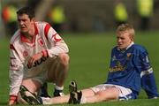 28 April 2002; Cavan players Edward Jackson, left, dejected after the Allianz National Football League Division 1 Final match between Tyrone and Cavan at St Tiernach's Park in Clones, Monaghan. Photo by Damien Eagers/Sportsfile
