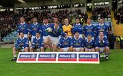 28 April 2002; Cavan captain Anthony Forde jumps up from the team photograph prior to the Allianz National Football League Division 1 Final match between Tyrone and Cavan at St Tiernach's Park in Clones, Monaghan. Photo by Damien Eagers/Sportsfile