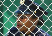 5 May 2002; Detective Beecher of Patrol Borough Bronx HQ watches the Bank of Ireland Connacht Senior Football Championship Quarter-Final match between New York and Sligo at Gaelic Park in New York, USA. Photo by Ray McManus/Sportsfile