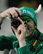17 September 2011; Ireland supporter Brian Mitchell, from Cork City, takes a photograph. 2011 Rugby World Cup, Pool C, Australia v Ireland, Eden Park, Auckland, New Zealand. Picture credit: Brendan Moran / SPORTSFILE