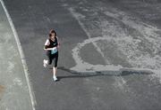 17 September 2011; Alison O' Donnell, from  Westmeath, in action during the National Lottery Half Marathon. Phoenix Park, Dublin. Picture credit: Stephen McCarthy / SPORTSFILE