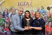 7 April 2017; Marie Ambrose, UCC and Cork, receiving her LGFA HEC All Star Award from Marie Hickey, President of the LGFA, and Donal Barry from the Ladies HEC at Croke Park Hotel on Friday, April 7th. The LGFA HEC All Star Awards recognised the best performers from the O’Connor Cup weekend recently hosted by GMIT at the Ballyhaunis Centre of Excellence and Elvery’s McHale Park. The Croke Park Hotel in Dublin, Jones' Road, Dublin 3. Photo by Piaras Ó Mídheach/Sportsfile