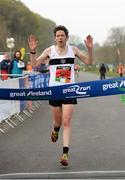 9 April 2017; Emmet Ó Briain of Donore Harriers Athletic Club, Co. Dublin, crosses the line to win the Great Ireland Run Men's 5k at Phoenix Park, in Dublin. Photo by Seb Daly/Sportsfile