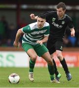 9 April 2017; Daragh Walshe of Evergreen FC in action against Aaron Caplin of Boyne Celtic during the FAI Junior Cup Semi Final match in association with Aviva and Umbro between Boyle Celtic and Evergreen FC at The Showgrounds, in Sligo. Photo by David Maher/Sportsfile