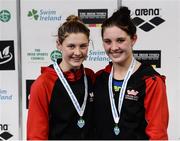 9 April 2017; Sister Leah, left, and Rachel Bethal of Lisburn Swim Club, Co. Antrim, after finshing second and first in the Women's 1500 Freestyle Final during the 2017 Irish Open Swimming Championships at the National Aquatic Centre in Dublin. Photo by Seb Daly/Sportsfile