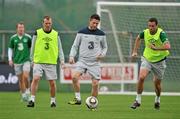 4 October 2011; Republic of Ireland's Robbie Keane in action against Damien Delaney, right, and Glenn Whelan during squad training ahead of their EURO 2012 Championship Qualifier against Andorra on Friday. Republic of Ireland Squad Training, Gannon Park, Malahide, Dublin. Picture credit: David Maher / SPORTSFILE