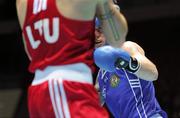 4 October 2011; Roy Sheehan, St Michael's Athy B.C., Kildare, representing Ireland, during his 69kg bout with Egidijus Kavaliauskas, Lithuania. Roy Sheehan was defeated on a score of 11-7. 2011 AIBA World Boxing Championships - Last 16, Roy Sheehan v Egidijus Kavaliauskas. Heydar Aliyev Sports and Exhibition Complex, Baku, Azerbaijan. Picture credit: Stephen McCarthy / SPORTSFILE