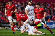 15 April 2017; Stuart Olding of Ulster is tackled by Francis Saili of Munster during the Guinness PRO12 match between Munster and Ulster at Thomond Park in Limerick. Photo by Ramsey Cardy/Sportsfile