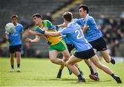 15 April 2017; Stephen McBrearty of Donegal in action against, from left, Andrew McGowan, Aaron Elliot and Darren Gavin of Dublin during the EirGrid GAA Football All-Ireland U21 Championship Semi-Final match between Dublin and Donegal at Kingspan Breffni Park in Cavan. Photo by Cody Glenn/Sportsfile