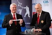 6 October 2011; President of the Ulster Council Aogán O'Fearghail, left, pulls out the name of Donegal, alongside Secretary of the Ulster Council Danny Murphy, while making the draw for the Ulster Senior Football Championship during the draws for the 2012 GAA All-Ireland Senior Championship, Croke Park, Dublin. Picture credit: Barry Cregg / SPORTSFILE