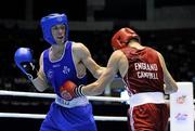 7 October 2011; John Joe Nevin, Cavan B.C., representing Ireland, left, exchanges punches with Luke Campbell, England, during their 56kg bout. Nevin was defeated on countback after the bout ended 12-12. 2011 AIBA World Boxing Championships - Semi-Finals, John Joe Nevin v Luke Campbell. Heydar Aliyev Sports and Exhibition Complex, Baku, Azerbaijan. Picture credit: Stephen McCarthy / SPORTSFILE