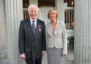 7 October 2011; Pat Hickey, President of the Olympic Council of Ireland, was presented with France's highest honour, the Legion D'Honneur, at a reception at the French Embassy, Dublin. The award was made in recognition of his services to Olympic sport and was presented by the Ambassador of France in Ireland, Mme Emmanuelle d'Achon. Pictured at the presentation is Pat Hickey, President of the Olympic Council of Ireland, with the Ambassador of France in Ireland, Mme Emmanuelle d'Achon. Residence de France, Ailesbury Road, Dublin. Picture credit: Brian Lawless / SPORTSFILE