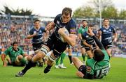 8 October 2011; Devin Toner, Leinster, goes over to score his side's first try despite the challenge of Matthew Jarvis, Connacht. Celtic League, Leinster v Connacht, RDS, Ballsbridge, Dublin. Picture credit: Pat Murphy / SPORTSFILE