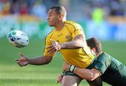 8 October 2011; Will Genia, Australia, is tackled by Morné Steyn, South Africa. Australia v South Africa, 2011 Rugby World Cup, Quarter-Final, Wellington Regional Stadium, Wellington, New Zealand. Picture credit: Brendan Moran / SPORTSFILE