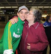 9 October 2011; Olympic Qualifier Michael Conlan gets a kiss from his Grandmother Rita on his return from the 2011 AIBA World Boxing Championships. Dublin Airport, Dublin. Picture credit: Ray Lohan / SPORTSFILE