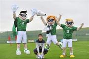 10 October 2011; Three, proud sponsors of the Republic of Ireland football team, today launch the new official football team mascots, pictured here with Republic of Ireland’s Shane Long. The new mascots will be given names by fans of the RTE show “ELEV8” and will make their Ireland debut tomorrow night, both outside the Aviva stadium and pitch-side for the crucial qualifying match against Armenia. Three also announced the extension of the Three Jersey trade-in scheme, that gives Irish fans the chance to trade-in their old Ireland football jerseys in any Champion Sports store nationwide to get €20 off the brand-new Republic of Ireland home jersey. The traded-in jerseys will be collected and donated to ‘Friends in Ireland’, a charity founded by Marian Finucane that cares for orphans and vulnerable children affected by HIV/AIDS in South Africa. For more details check out www.facebook.com/3football. Gannon Park, Malahide, Dublin. Picture credit: David Maher / SPORTSFILE