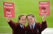 10 October 2011; Show Racism the Red Card launched their programme of activities for 2011-2012 today. It kicked off with an outreach programme that will see FAI Development Officers deliver anti-racism & coaching activities in over 100 school as part of the UEFA Football Against Racism in Europe week. Pictured at the launch are Nicole Flynn, left, age 12, and Rachel Purcell, age 11, from St. Raphael's Primary School, Ballyfermot, Co. Dublin. Tallaght Stadium, Tallaght, Dublin. Photo by Sportsfile