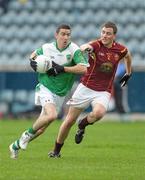 15 October 2011; Peadar Carton, O'Tooles, in action against Rory O'Connor, St. Oliver Plunketts Eoghan Rua. Dublin County Senior Football Championship, Round 4, St Oliver Plunketts Eoghan Rua v O’Tooles, Parnell Park, Dublin. Photo by Sportsfile