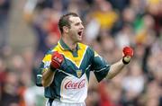 17 October 2004; Steven McDonnell, Ireland, celebrates scoring his sides first goal against Australia. Coca Cola International Rules Series 2004, First Test, Ireland v Australia, Croke Park, Dublin. Picture credit; Brendan Moran / SPORTSFILE *** Local Caption *** Any photograph taken by SPORTSFILE during, or in connection with, the 2004 Coca Cola International Rules Series which displays GAA logos or contains an image or part of an image of any GAA intellectual property, or, which contains images of a GAA player/players in their playing uniforms, may only be used for editorial and non-advertising purposes.  Use of photographs for advertising, as posters or for purchase separately is strictly prohibited unless prior written approval has been obtained from the Gaelic Athletic Association.