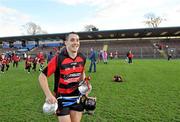 16 October 2011; Ballygunner captain Shane O'Sullivan makes his way from the pitch with the cup. Waterford County Senior Hurling Championship Final, Ballygunner v Tallow, Walsh Park, Co. Waterford. Picture credit: Brian Lawless / SPORTSFILE
