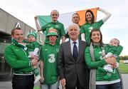 4 November 2011; Republic of Ireland manager Giovanni Trapattoni encourages fans to Go Green on November the 15th. Pictured with Republic of Ireland manager Giovanni Trapattoni are, front row from left, Aidan Brett, with his son Seamus Brett, 15 months, from Asbourne, John Molloy, from Offaly, and Karen O'Mahony,  with her son Sean O'Mahony, 9 weeks, from Stillorgan, and, back row, from left, Eoin Byrne, from Tyrone, Martin Molloy, from Offaly, and Laura Carney, from Kildare. FAI Headquarters, Abbotstown, Dublin. Picture credit: Brian Lawless / SPORTSFILE