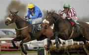 5 November 2011; Benny's Fagartha, left, with Edward Power up, jump the last on their way to winning the Pudsey Maiden Hurdle, ahead of 2nd place High Desert, with Davy Russell up. Down Royal Racecourse, Lisburn, Co. Down. Photo by Sportsfile