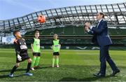 5 May 2017; In attendance at the 2017 launch of the SportsDirect.com FAI Summer Soccer Schools which are now open for bookings are, Republic of Ireland manager Martin O'Neill with, from left, 8 year old Brayden Adeboye, 9 year old Charlie Dunwoody and 8 year old Emma Sherrard. Photo by Ramsey Cardy/Sportsfile