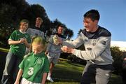 7 November 2011; Three, Sean St. Ledger, Simon Cox and Paul McShane, with children Jade Pakenham, age 11, left, and Emma Hayes, age 5, both from Dublin, are asking Irish fans to  'Go Green With Pride' to show their support for the crucial EURO playoffs against Estonia on November 11th and 15th. Three will be providing face painters at the home leg to paint fans' faces green and placing 50K green cards for fans to hold up at the match on every chair in the Aviva Stadium on the 15th. Supporters can also still trade in their old Republic of Ireland football jerseys in any Champion Sports store nationwide and get €20 off the new home jersey. The traded in jerseys will be donated to Friends In Ireland, a charity founded by Marian Finucane that Sean St. Ledger is an ambassador with. The scheme has been extended to run until November 20th. Portmarnock Hotel and Golf Links, Portmarnock, Co. Dublin. Picture credit: David Maher / SPORTSFILE