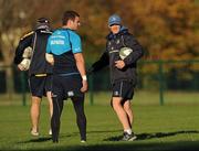 7 November 2011; Leinster Head Coach Joe Schmidt with Fergus McFadden, left, during squad training ahead of their Heineken Cup Pool 3 Round 1 match against Montpellier on Saturday November 12. Leinster Rugby Squad Training, UCD, Belfield, Dublin. Picture credit: Pat Murphy / SPORTSFILE