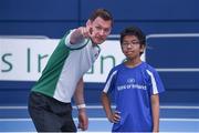 11 May 2017; Over 200 students from across Ireland gathered in the National Sports Campus, Abbottstown, today to take part in an athletics masterclass with European Indoor Championship gold medallist, David Gillick. Bank of Ireland and Athletics Ireland joined forces in 2016 to launch a nationwide search amongst secondary schools to identify and foster talented athletics students and today these students participated in a masterclass with David Gillick. As well as taking part in athletics activities with David Gillick, the students received advice and tips from Ireland’s top sports psychologists and nutritionists. Pictured taking part in the masterclass today alongside David Gillick is Paul Paus, age 13, from Woodbook College, Co Dublin. Photo by Cody Glenn/Sportsfile